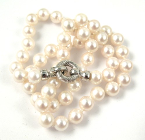 Appraisal: PEARL AND EIGHTEEN KARAT GOLD NECKLACE - in length and