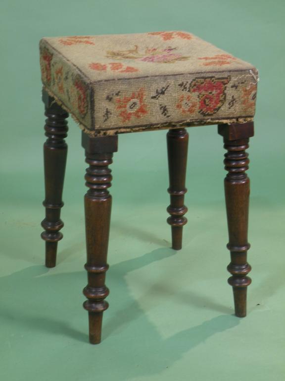 Appraisal: An early thC mahogany stool the upholstered square top on