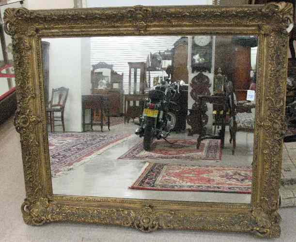 Appraisal: A LARGE VICTORIAN GILT WOOD AND GESSO WALL MIRROR of