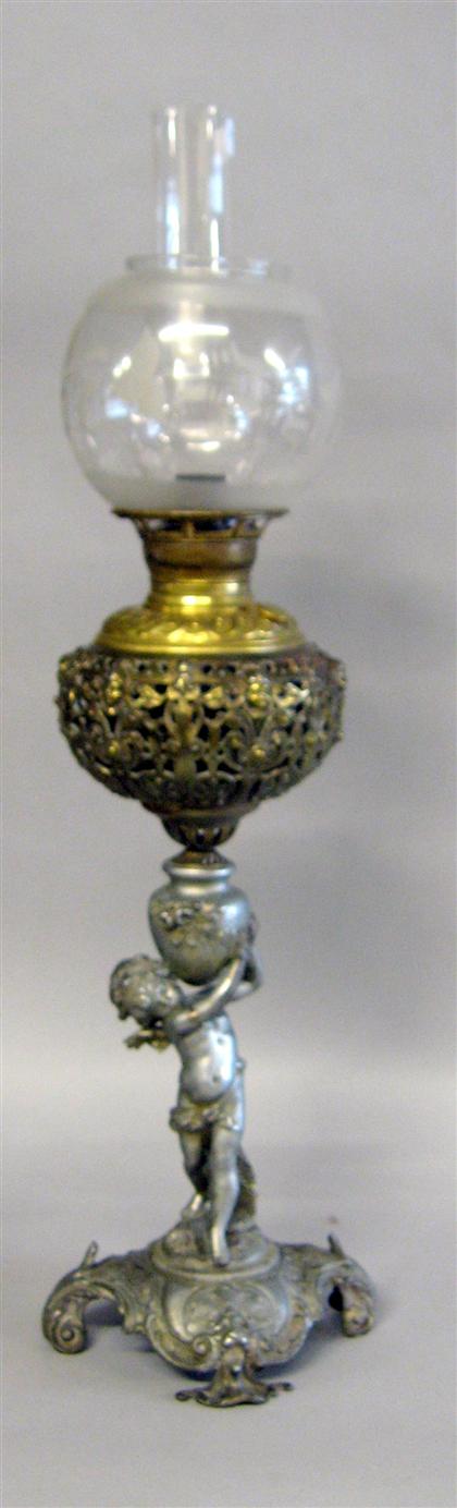 Appraisal: Continental style pewter and gilt metal oil lamp th century