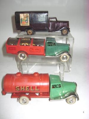 Appraisal: Three Minic clockwork tinplate toys comprising L M S Express