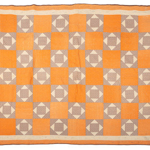 Appraisal: An Orange and Floral Fabric Box Pieced Cotton Quilt x