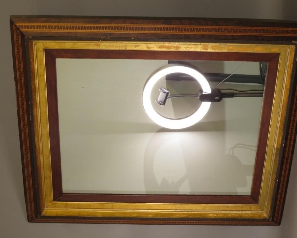 Appraisal: INLAID FRAMED MIRRORca in a dark wood with some burl