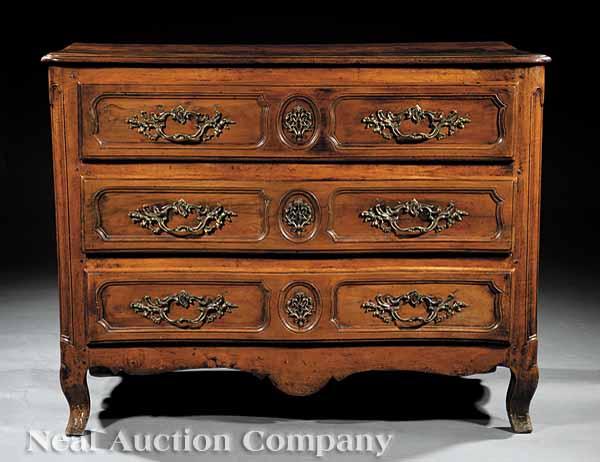 Appraisal: A Louis XV Carved Fruitwood Commode th c serpentine top