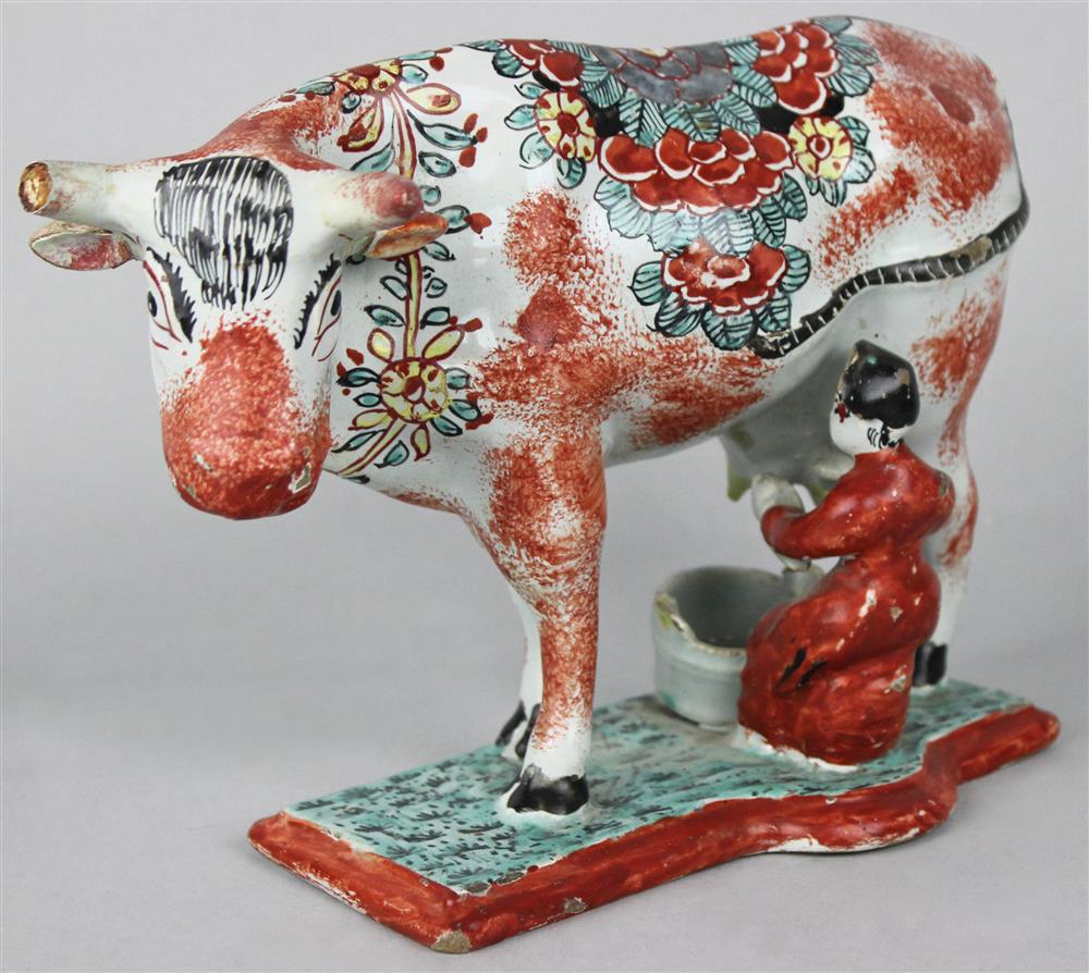 Appraisal: DUTCH DELFT MILKING GROUP late th C the cow with