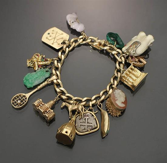 Appraisal: -Karat Yellow-Gold Charm Bracelet Having sixteen -karat -karat -karat silver