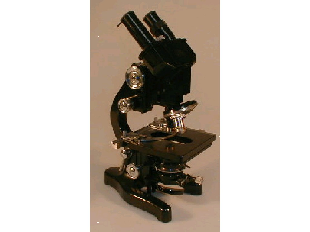 Appraisal: A cased Leitz binocular microscope cased with assorted lens microscope