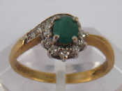 Appraisal: A carat gold emerald and diamond ring emerald approx x