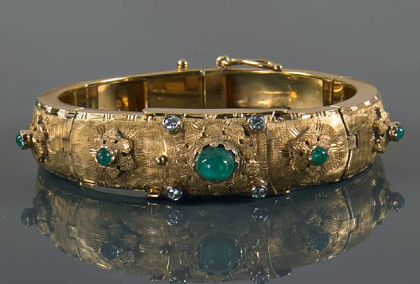 Appraisal: An emerald diamond and gold dial-covered watch bangle dial signed