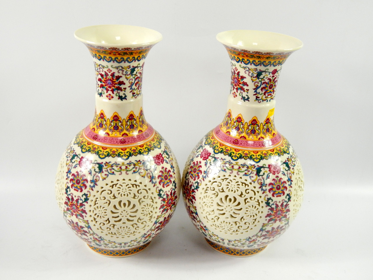 Appraisal: A pair of Chinese porcelain Famille Rose vases of baluster