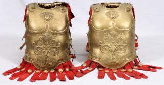 Appraisal: TWO PROP GOLD-PAINTED BREASTPLATES FROM BEN HUR Metro-Goldwin-Mayer Gold-painted metal