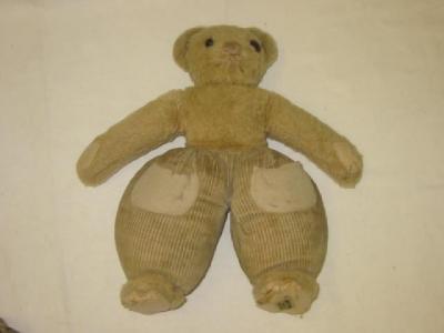 Appraisal: A pre-war Merrythought Dutch Teddy covered in pale gold plush