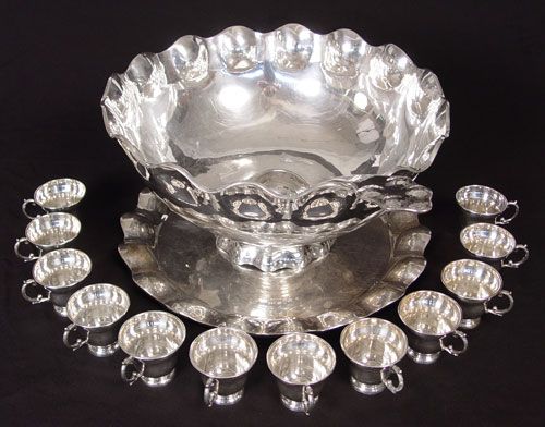 Appraisal: A FINE GIGANTESQUE ORTEGA MEXICAN STERLING PUNCH BOWL TRAY CUPS