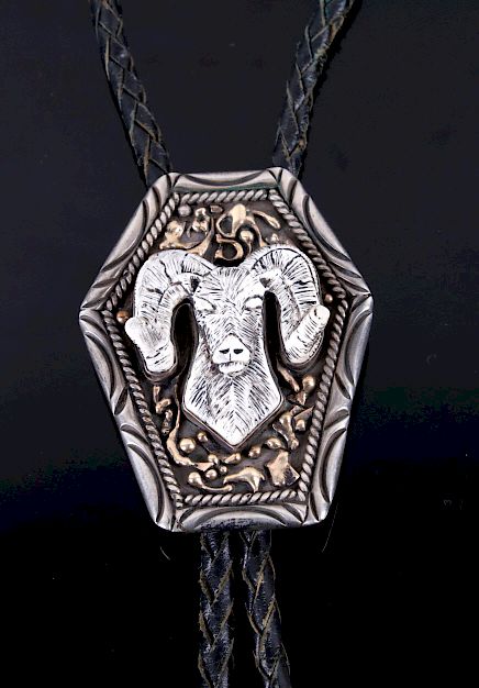 Appraisal: K Gold Sterling Silver Scrimshaw Ramhead Bolo For your bidding