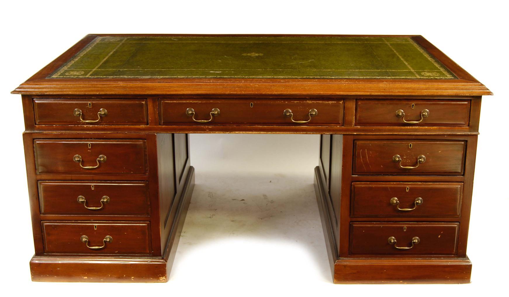 Appraisal: A mahogany twin pedestal partner s desk