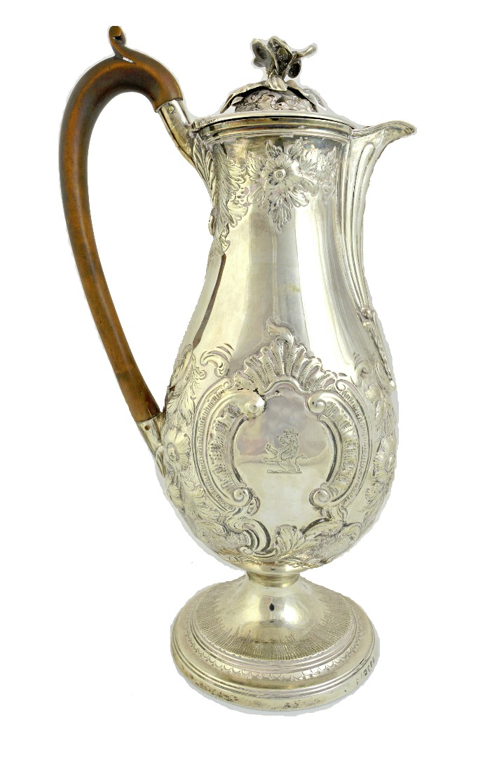 Appraisal: A George III silver hot water jug of baluster form