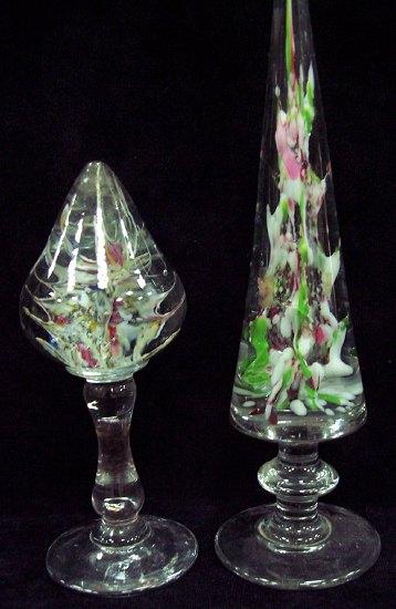 Appraisal: A pear shaped glass drop on a baluster column support