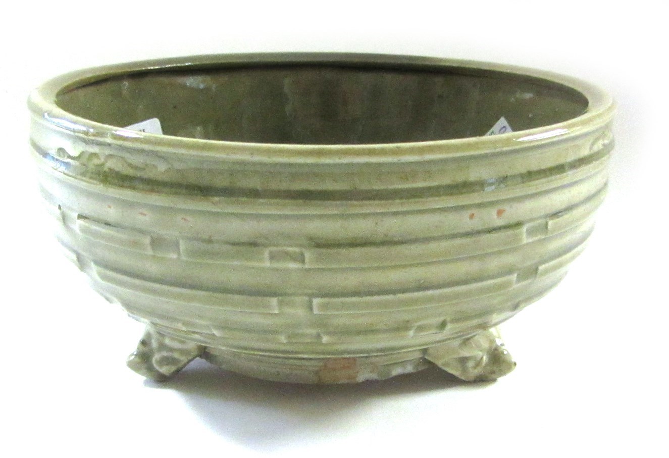 Appraisal: A Chinese celadon tripod censer of circular form decorated in