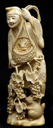 Appraisal: JAPANESE CARVED IVORY OKIMONO Of a bare-foot smiling peasant holding