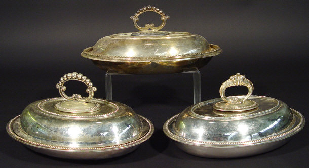 Appraisal: Three oval silver plated entree dishes and covers with detachable