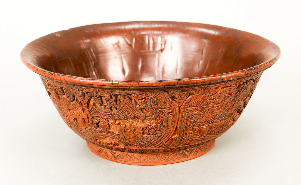 Appraisal: Large cinnabar bowl the lacquered sides intricately carved with cartouches