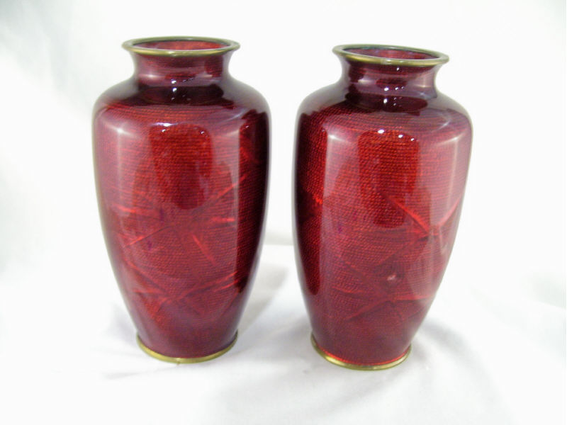 Appraisal: Pair Flambe Enameled Oriental Vases Heavy red enamel over a