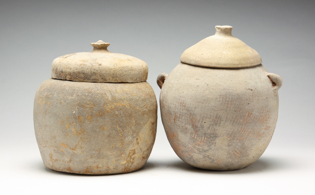 Appraisal: TWO KOREAN COVERED POTTERY JARS Kawa type possibly rd- th