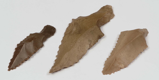 Appraisal: THREE EGYPTIAN FLINT ARROW HEADS with label from Gibelun about