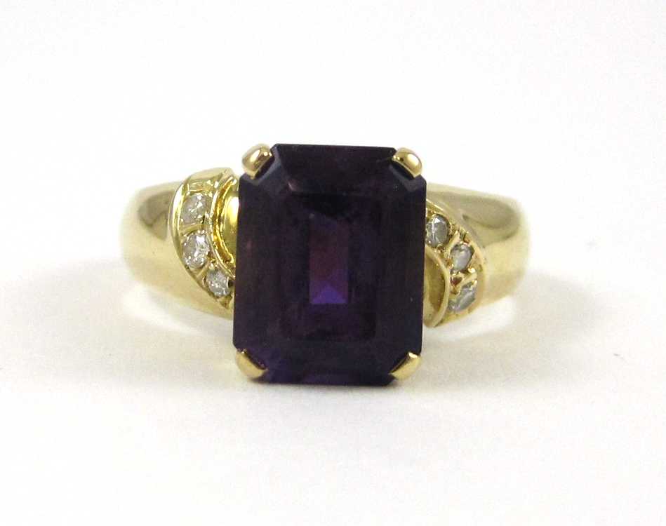 Appraisal: AMETHYST DIAMOND AND EIGHTEEN KARAT GOLD RING with three round-cut