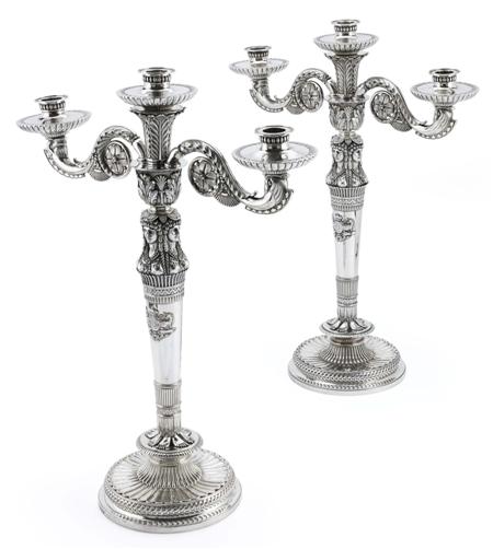 Appraisal: An exceptional pair of George III Royal three light candelabra