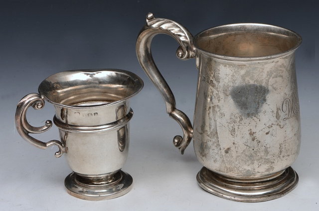 Appraisal: A GEORGE V SILVER TANKARD standing on a turned stepped