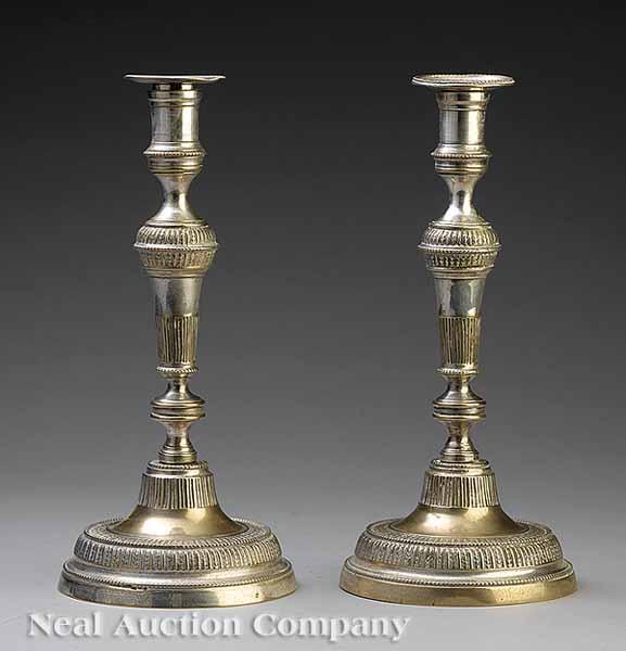 Appraisal: A Pair of Antique Continental Silverplate Candlesticks each knopped and