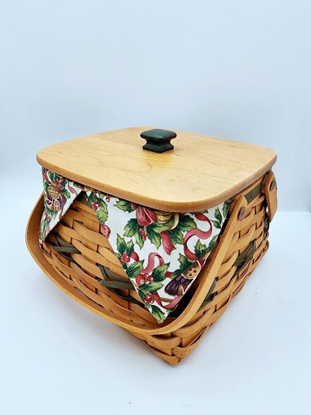 Appraisal: Longaberger Sewing Basket with Wood Lid Protector and divided Insert