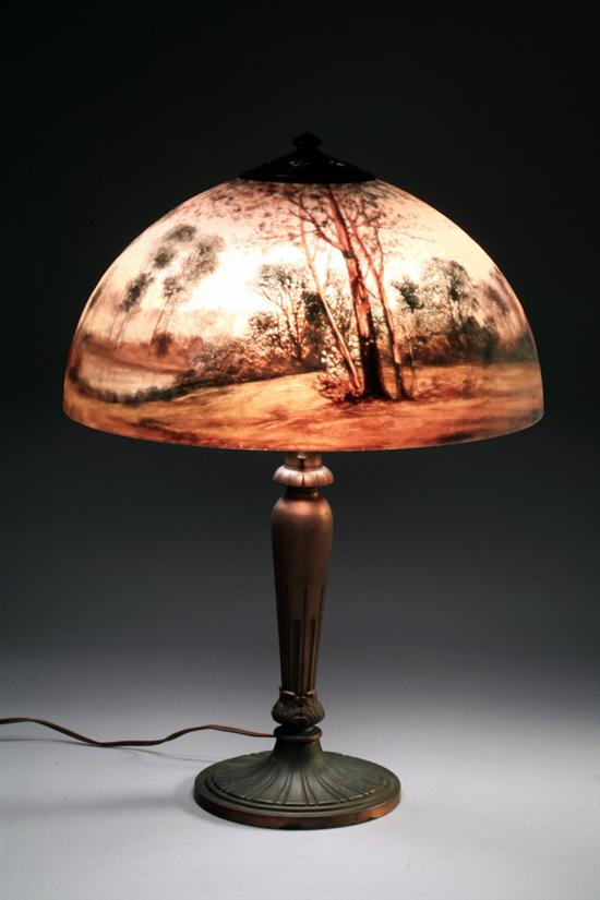 Appraisal: HANDEL REVERSE-PAINTED GLASS AND PATINATED-METAL THREE-LIGHT TABLE LAMP model introduced