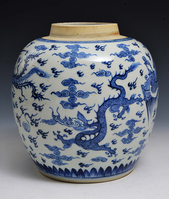 Appraisal: A CHINESE BLUE AND WHITE OVOID DRAGON AND PHOENIX GINGER