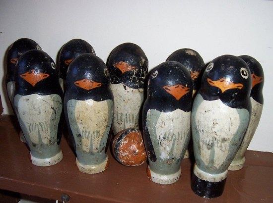 Appraisal: A set of nine turned wood skittles painted as penguins