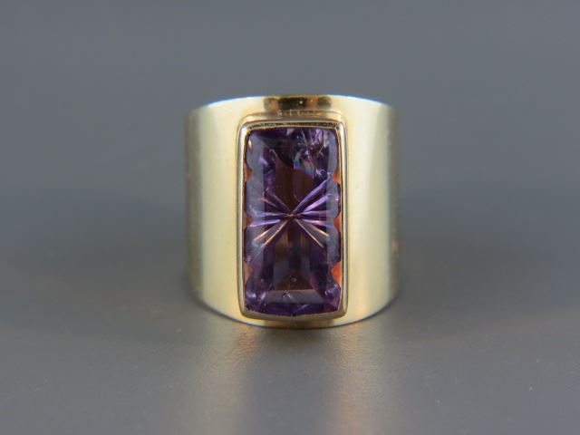 Appraisal: Amethyst Ring rectangular fantasy cut gem in heavy wide gold