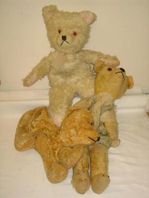 Appraisal: A teddy bear nightdress case with straw stuffed head blonde