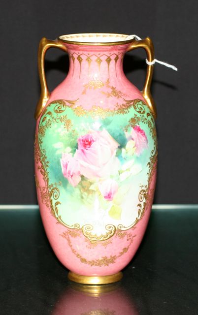 Appraisal: A Royal Doulton twin handled vase painted by Walter Slater