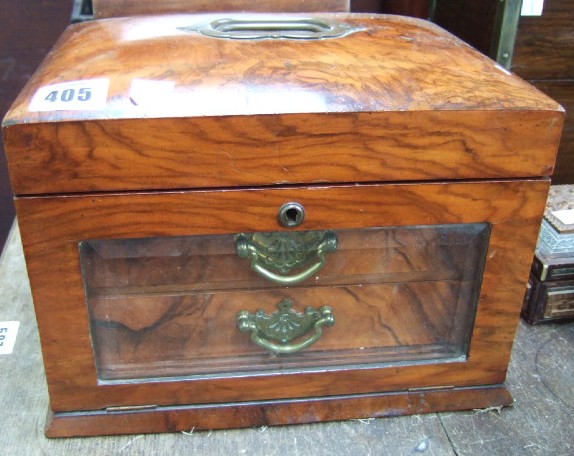 Appraisal: A th century walnut sewing box with glazed drop front