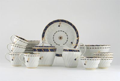 Appraisal: A Barr Worcester part tea service spiral-fluted with dark blue