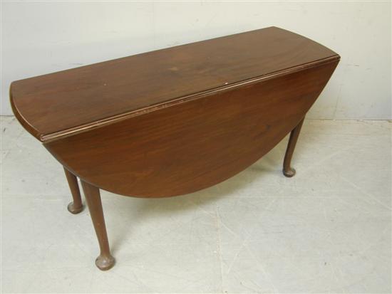 Appraisal: th century mahogany drop leaf dining table diameter h in