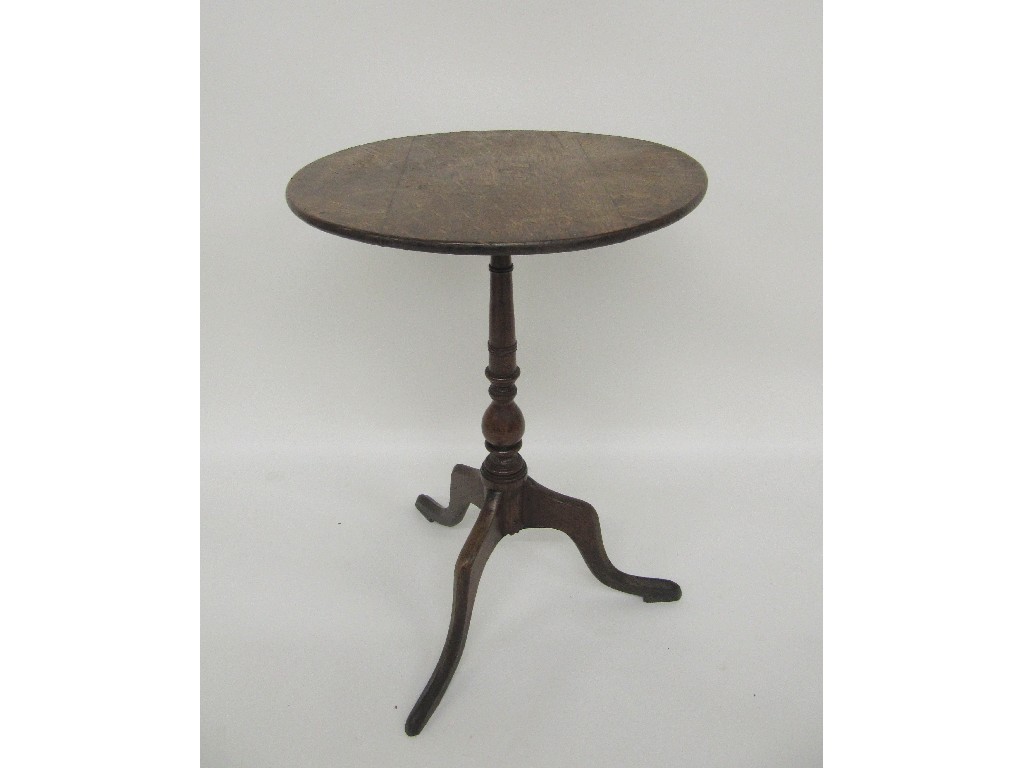 Appraisal: A Georgian mahogany tilt top tripod table the circular top