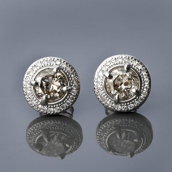 Appraisal: A pair of diamond and k white gold studs estimated