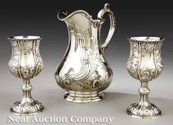 Appraisal: An American Rococo Coin Silver Water Pitcher and Two Goblets