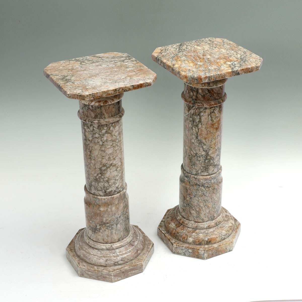 Appraisal: PAIR OF VARIEGATED BROWN MARBLE PEDESTALS variegated brown marble pedestals