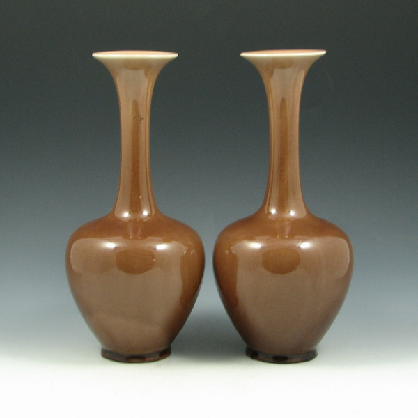 Appraisal: Pair of Wine Madder brown gloss Rookwood vases from Marked