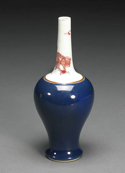 Appraisal: An underglaze blue and copper red decorated porcelain bottle vase