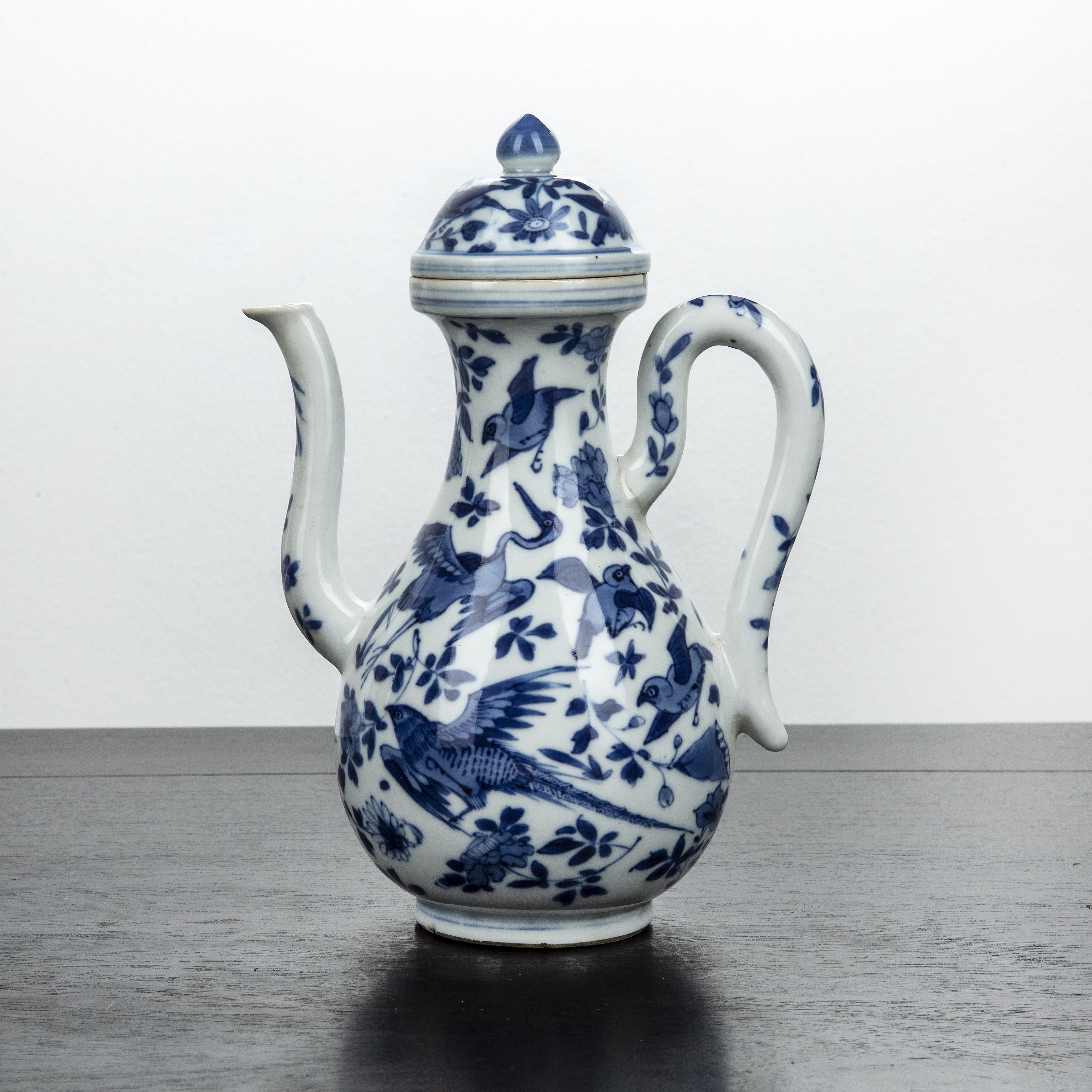 Appraisal: Blue and white porcelain ewer and coverChinese th th Century