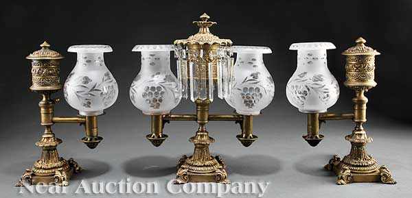 Appraisal: A Regency Gilt Bronze Three Piece Argand Lamp Garniture early